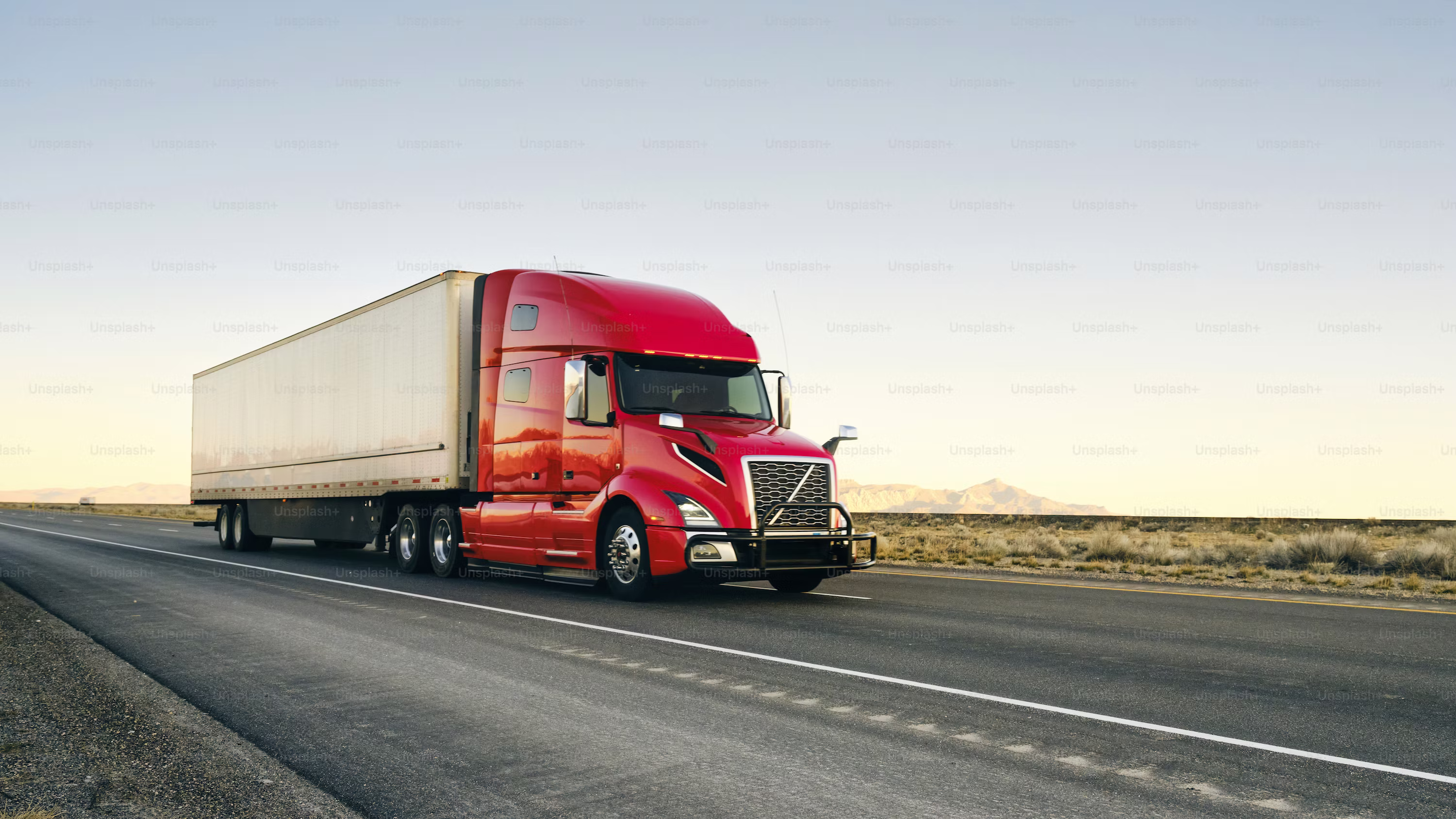 American semi-trucks parked on the highway — FM Group dispatch fleet